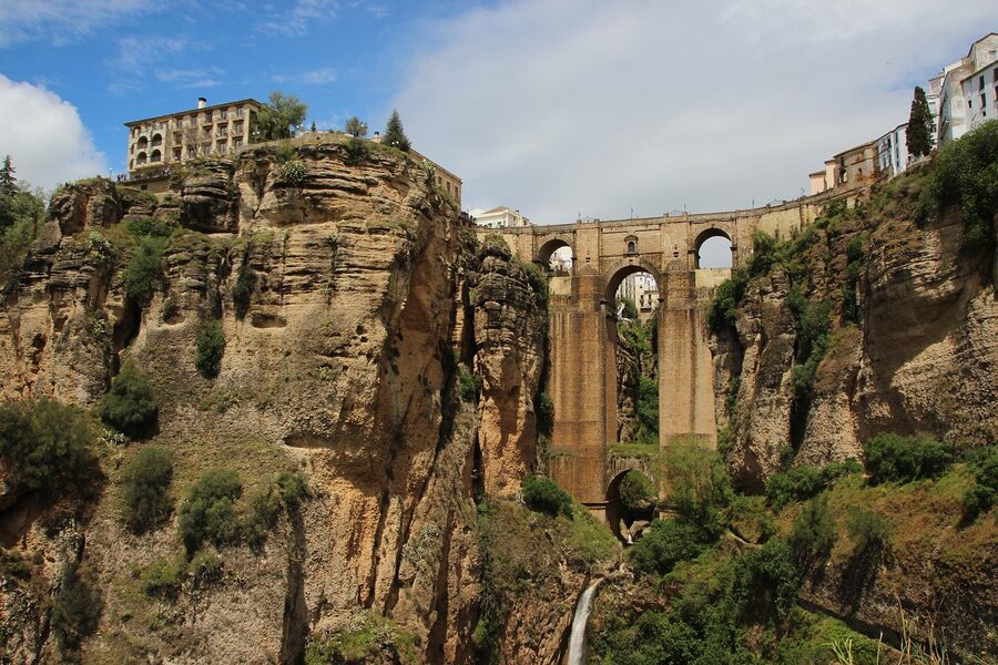 Classic view of Ronda Puente Nuevo with town behind