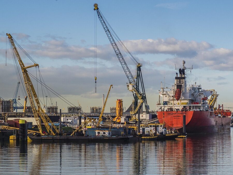 The Waalhaven port basin in Rotterdam with industrial harbour activity at night