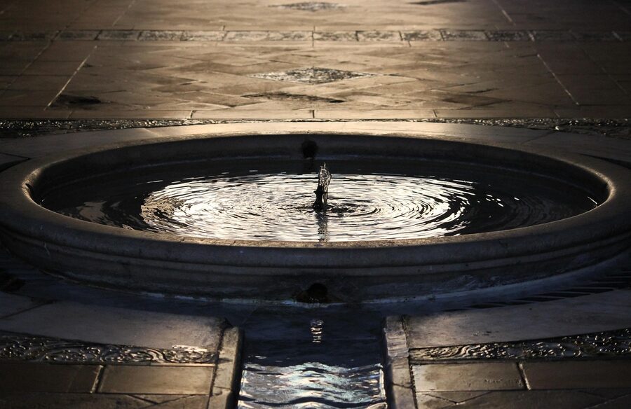 Mercury Pond Alcazar Seville gardens with arches