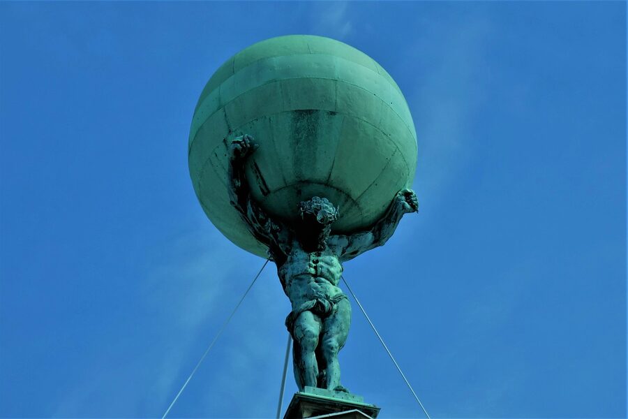 Atlas sculpture with globe at the Royal Palace Amsterdam