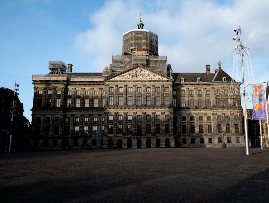 Royal Palace Amsterdam under restoration with scaffolding