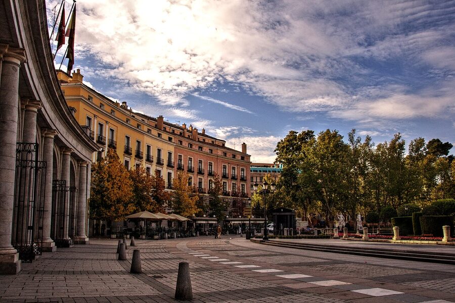 Plaza de Oriente Madrid with statues and gardens facing Royal Palace