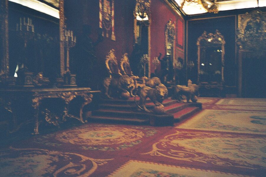 Throne Room Royal Palace Madrid showing twin thrones and red velvet walls