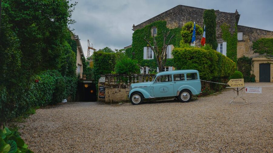 Vintage car parked at a Saint-Émilion château