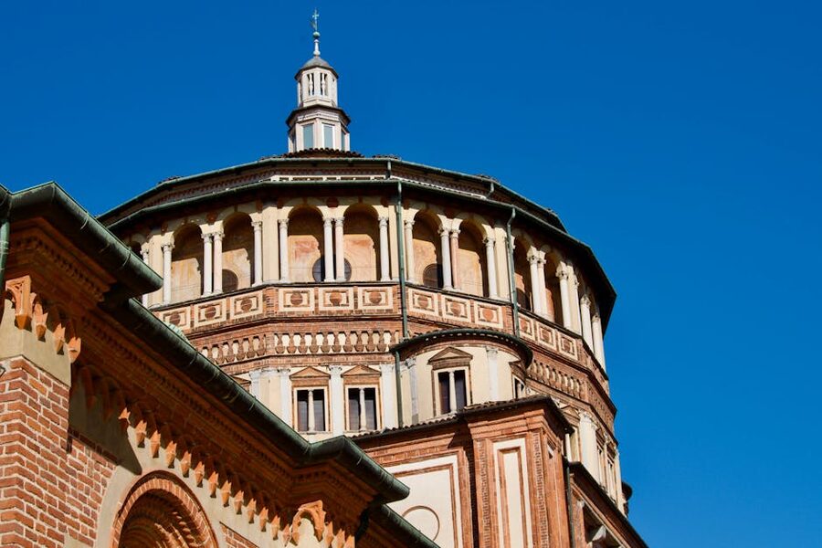Santa Maria delle Grazie dome detail under blue sky Milan