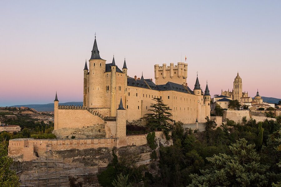 Alcazar of Segovia fairytale castle from below with rivers