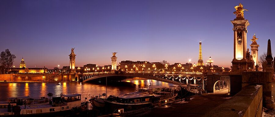 Pont Alexandre III in Paris with the Invalides dome behind