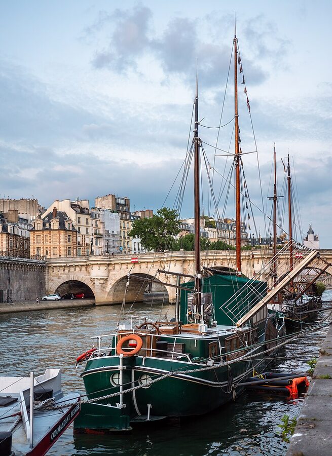 Cruise boats at Pont Neuf on the Seine in Paris