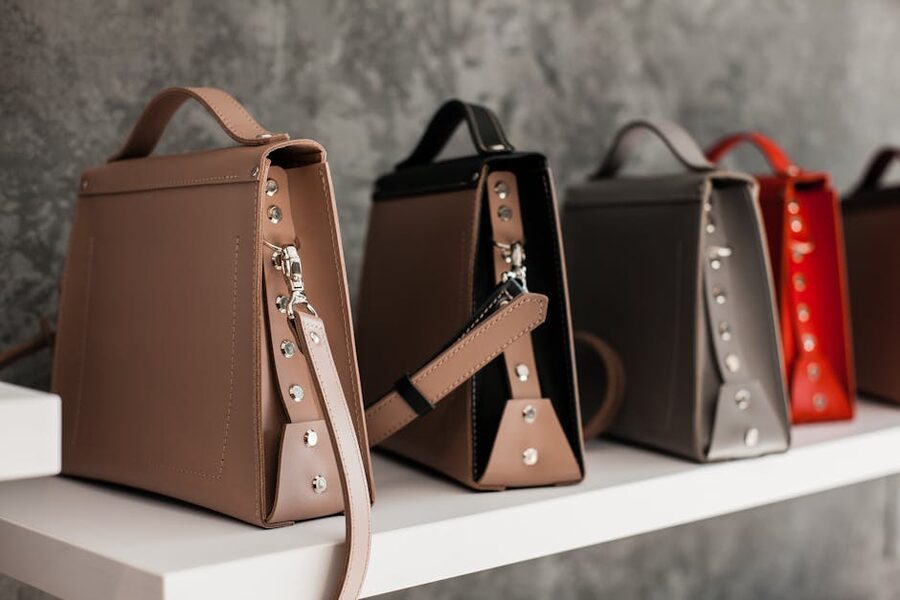 Luxury leather handbags on retail shelves