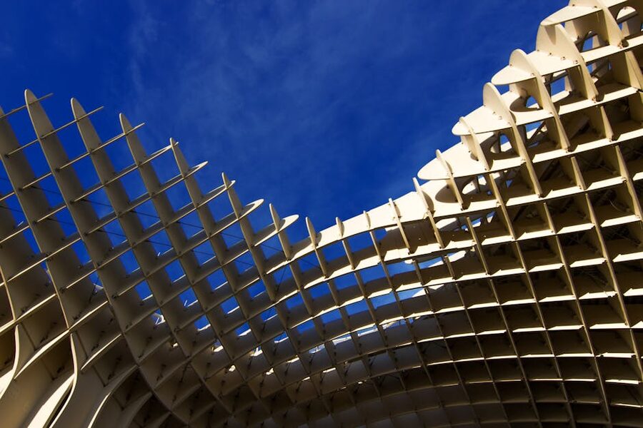 The wooden canopy of Setas de Sevilla against an intense blue sky