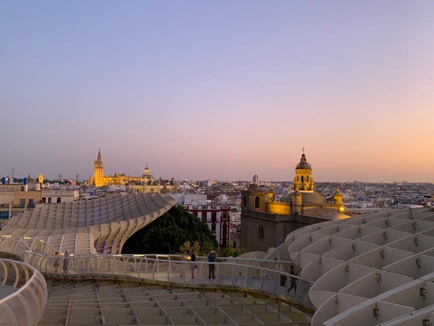 Sunset view of Seville from Setas de Sevilla with the cathedral skyline