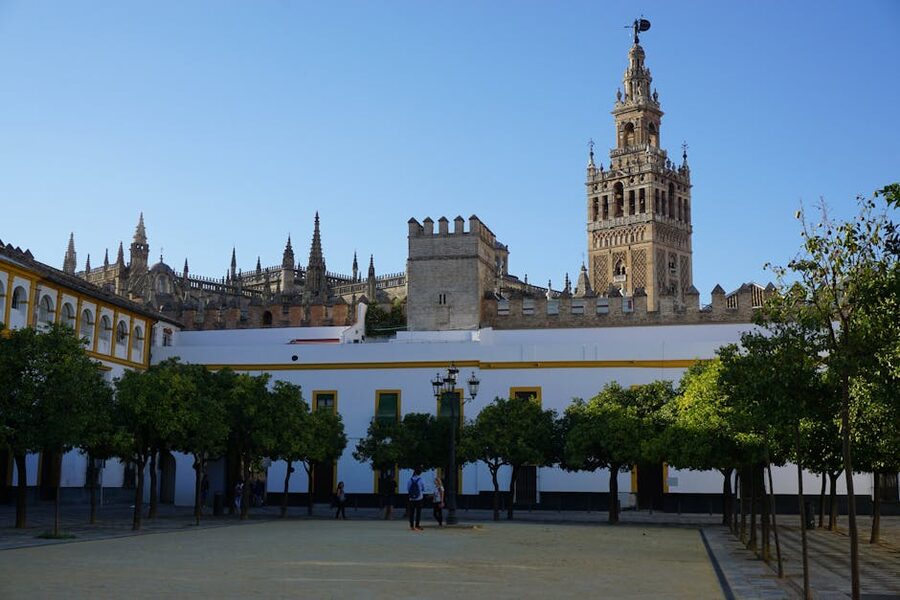 Giralda Tower and Seville Cathedral from below in daylight
