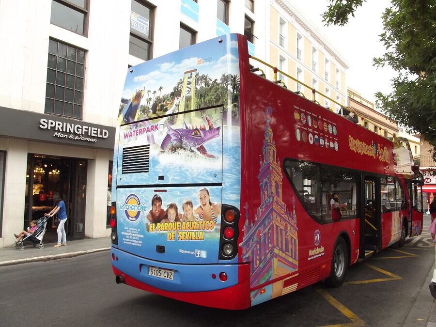 City Sightseeing red bus boarding at Plaza del Duque de la Victoria Seville