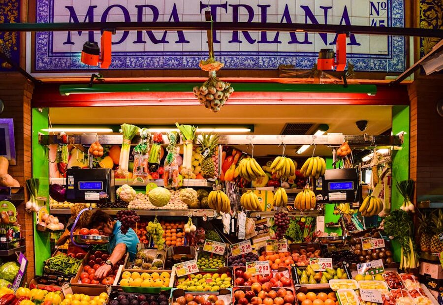 Triana Market fruit stall colourful display Seville