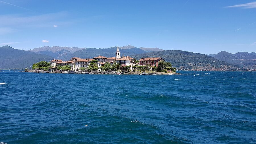 Stresa shore with Pescatori and the Alps in the distance