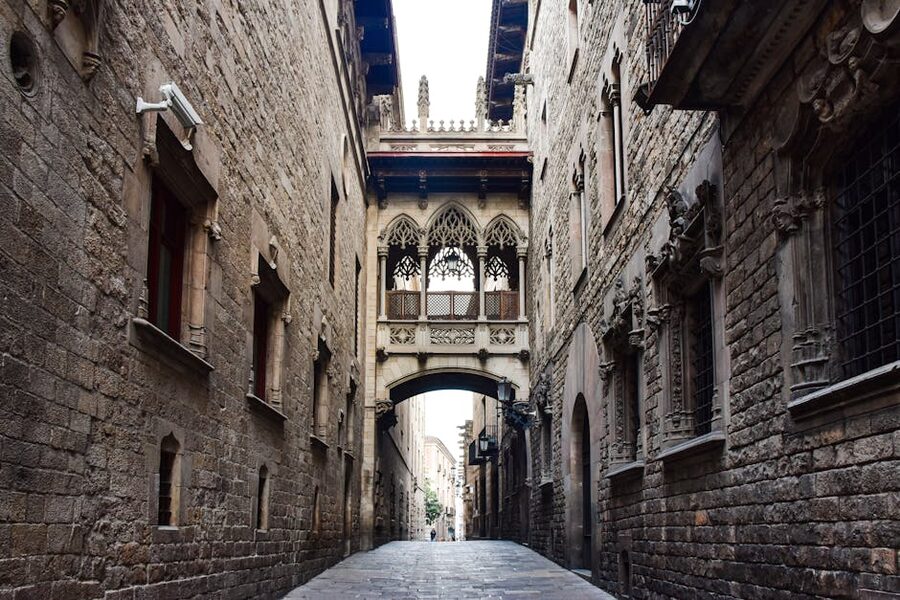 Cobblestone street in Barcelona Gothic Quarter at evening