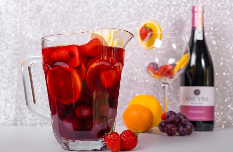 Sangria with fresh fruits in a wine glass