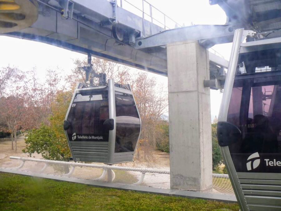 Modern cable car cabin of the Telefèric de Montjuïc against blue sky