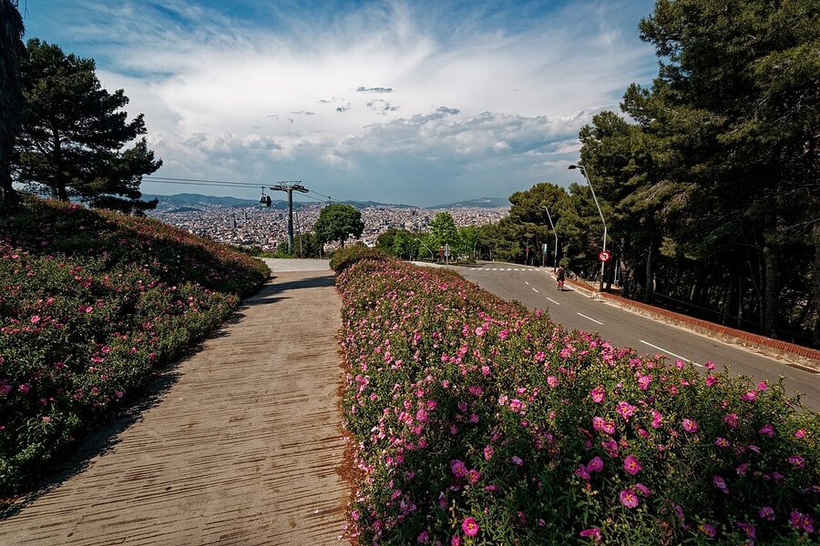 View north from Montjuïc with Sagrada Família visible in the distance under the cable car