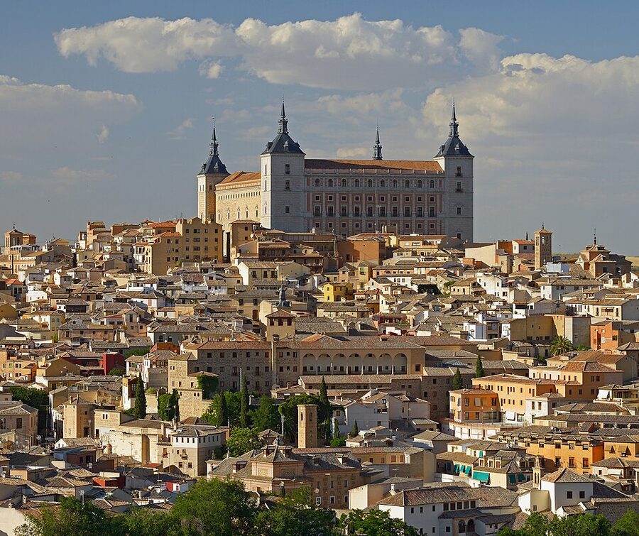 The square Alcázar fortress on top of the hill in Toledo, Spain