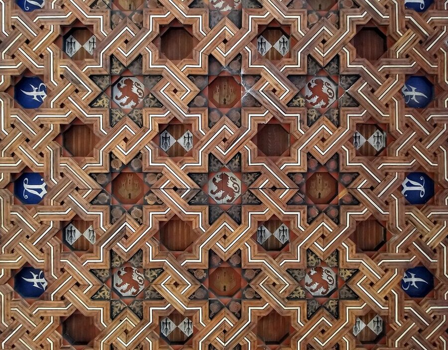 Exterior of the Monastery of San Juan de los Reyes in Toledo with chains hanging from the wall