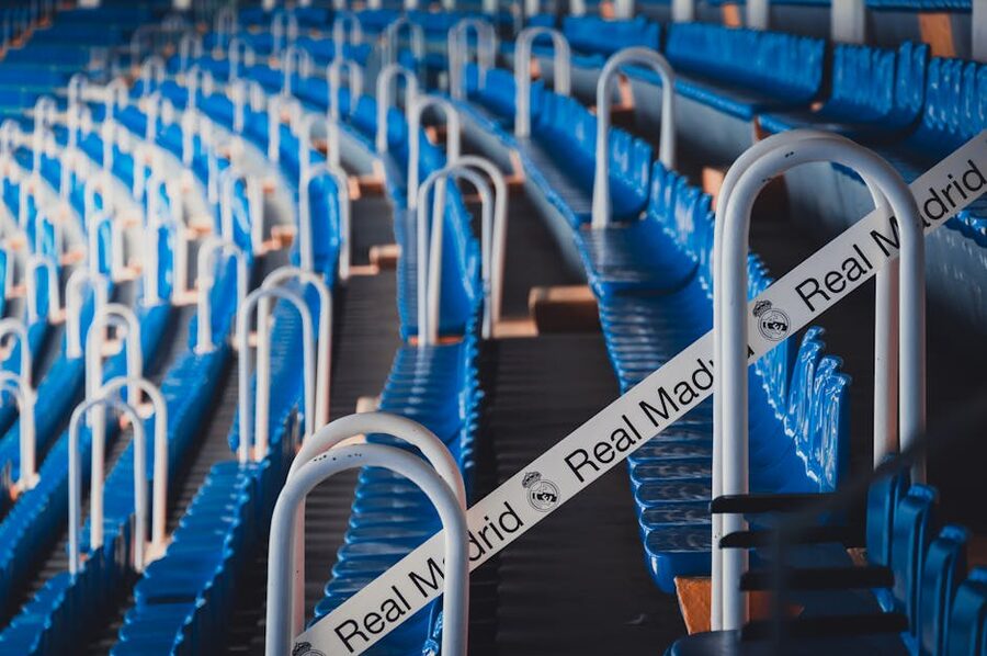 Rows of blue seats inside the Bernabéu