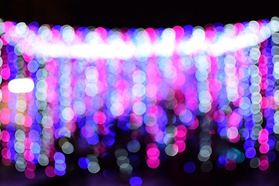 Bernabéu stadium at night with coloured lighting