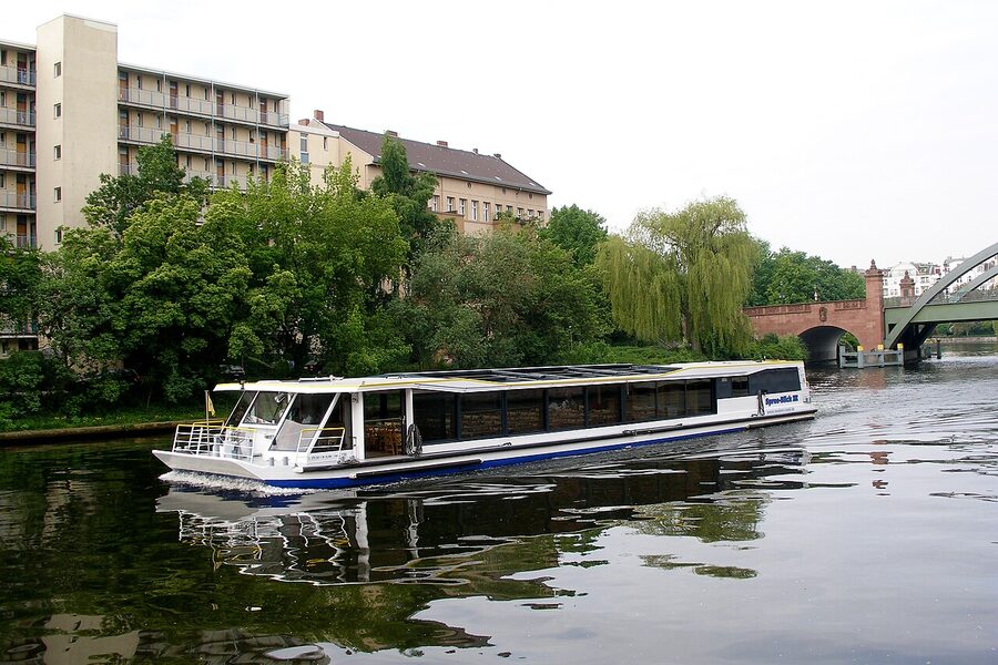 Tourboat passing on the Spree River in central Berlin