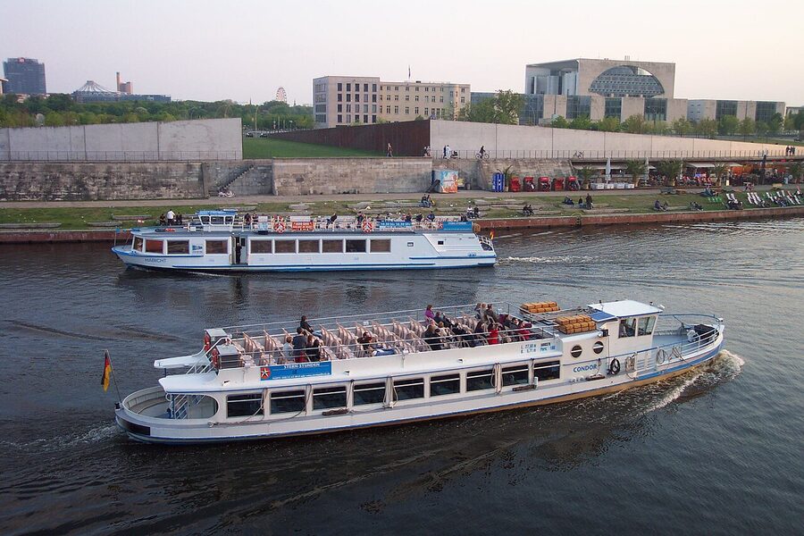 Trip boats on the Spree in Berlin in May 2011 lined up at piers