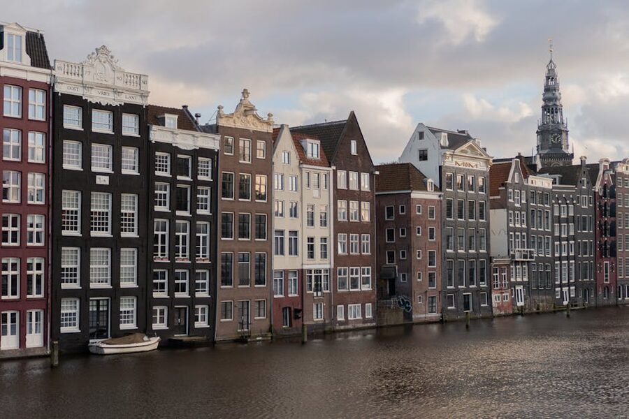 Damrak Amsterdam canal houses near the Upside Down Museum
