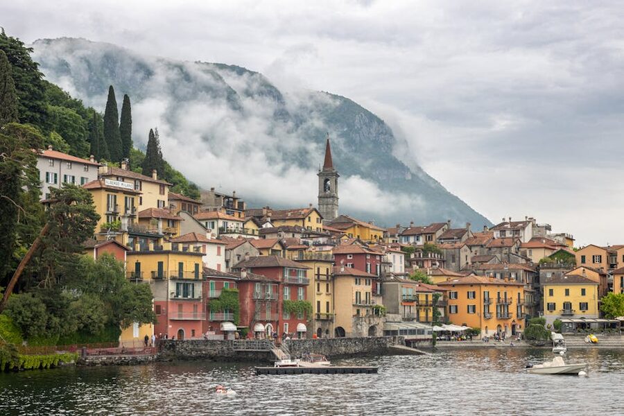 Varenna colorful houses in misty morning Lake Como