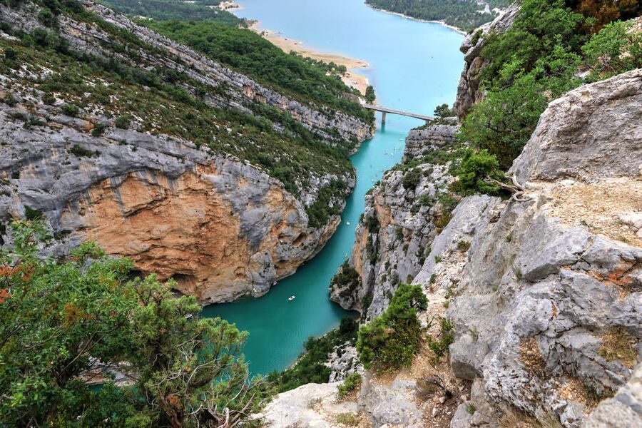 Verdon turquoise river winding between gorge cliffs aerial