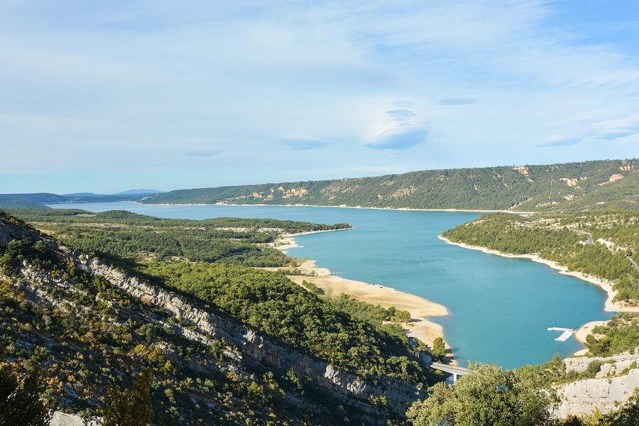 Verdon Gorge limestone canyon wall rising from turquoise river