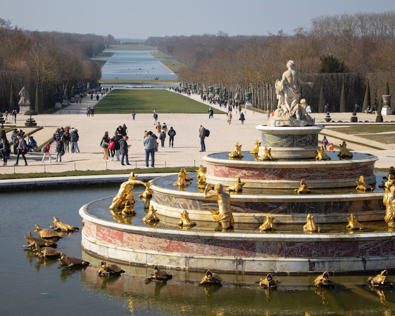 Gilded fountain in the gardens of Versailles