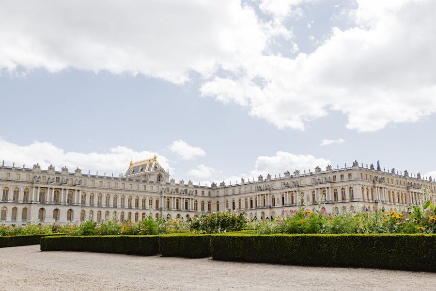 Palace of Versailles with formal gardens beyond