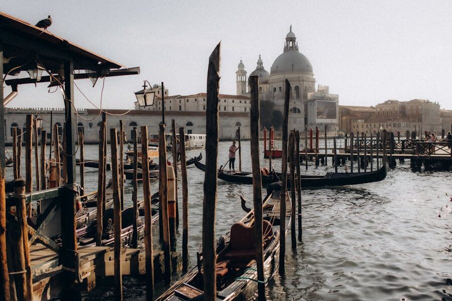 Grand Canal in Venice in the evening with gondolas and historic buildings