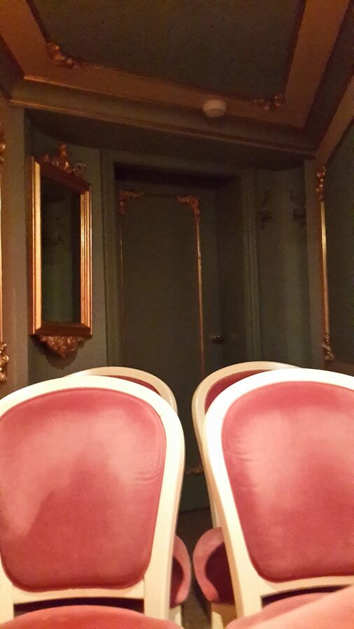 Side theatre box at La Fenice with red velvet seats and gilt detail, Venice