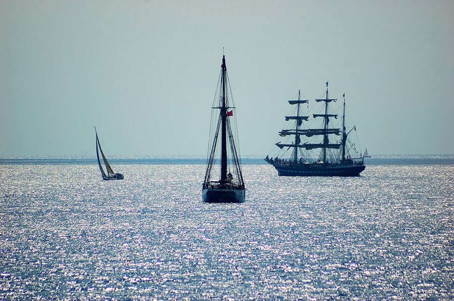 Sailboats on the horizon off Barcelona