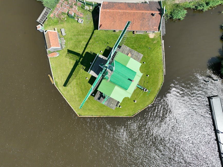 Aerial view of a Zaanse Schans windmill on its small island